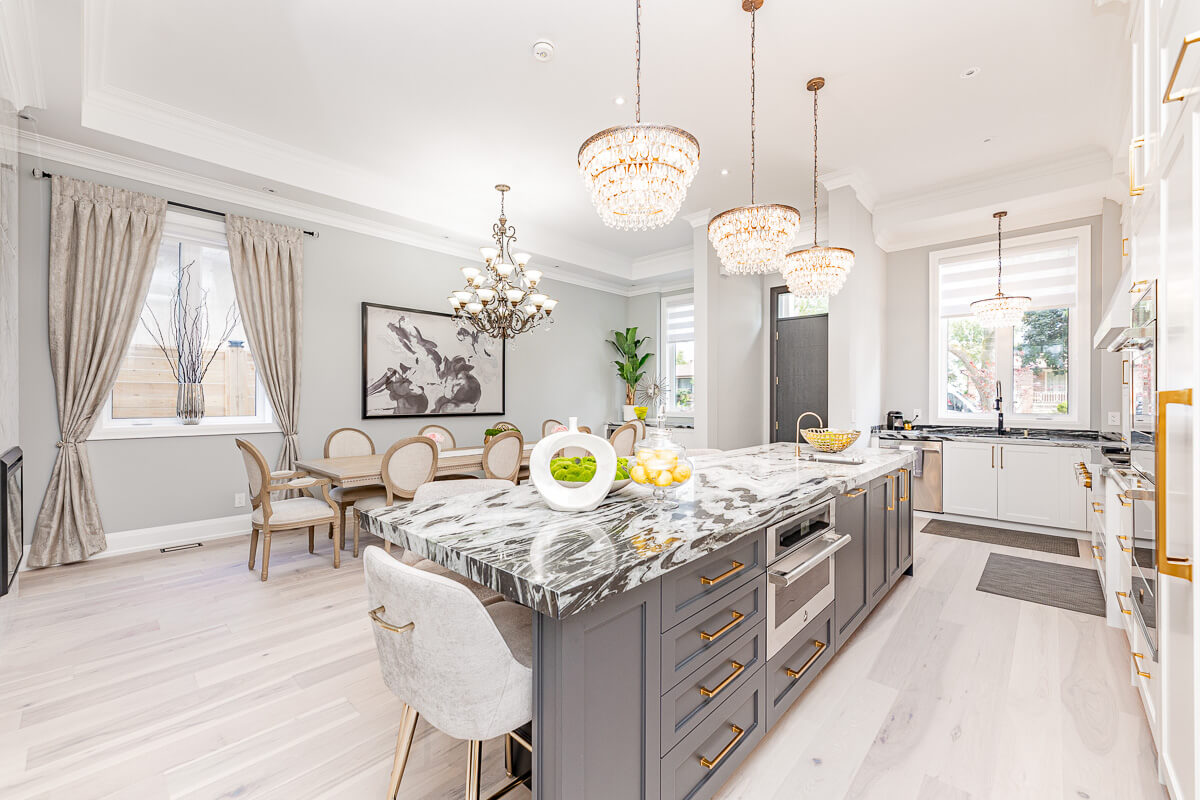 professionally staged living room with sofa and warm lighting Toronto real estate photography
