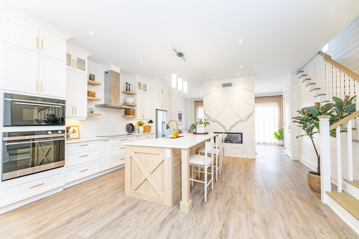 modern kitchen with large island and bar seating Toronto real estate photography