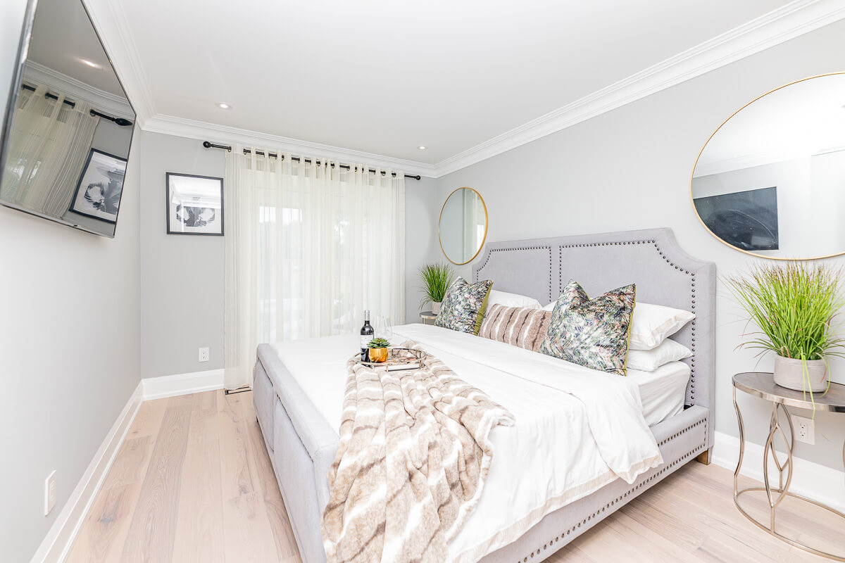 bright bedroom neutral design Toronto real estate photography services