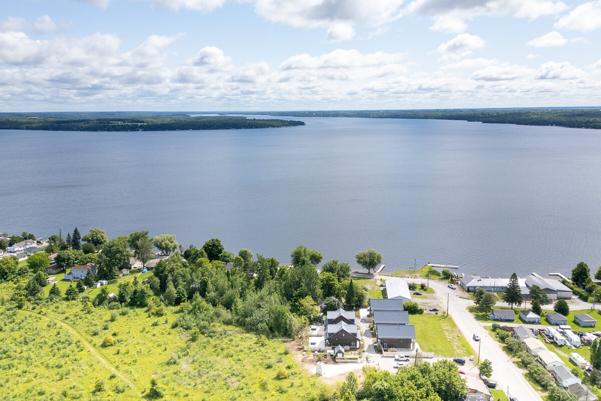 Suburban neighbourhood aerial with rows of houses and streets, real estate drone photography GTA