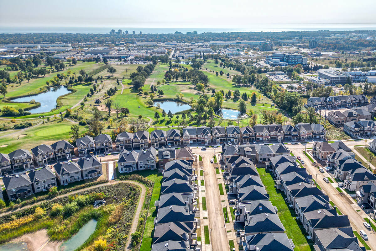 Aerial view of residential area near golf course, drone real estate photography Toronto