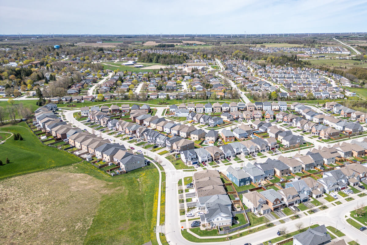 Wide aerial view of suburban development and houses, real estate drone photography GTA