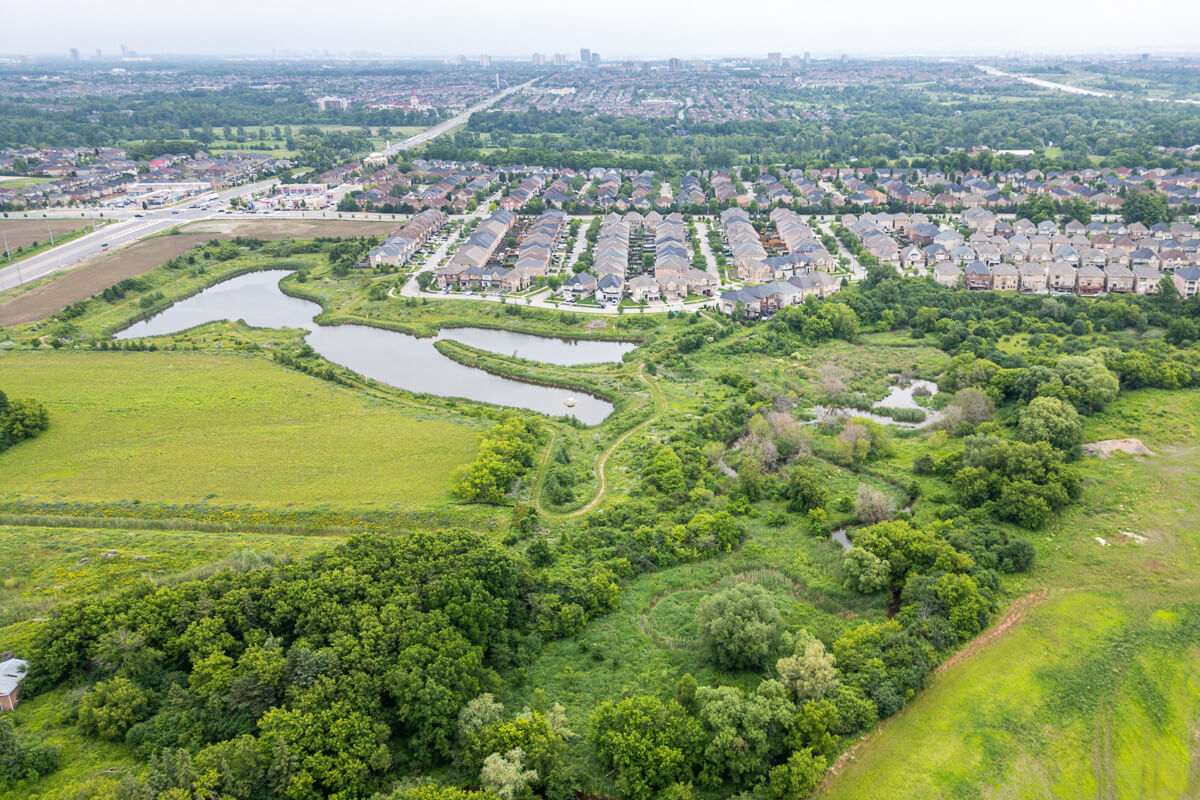 City aerial view with high rise buildings and neighbourhood, drone real estate photography Greater Toronto Area