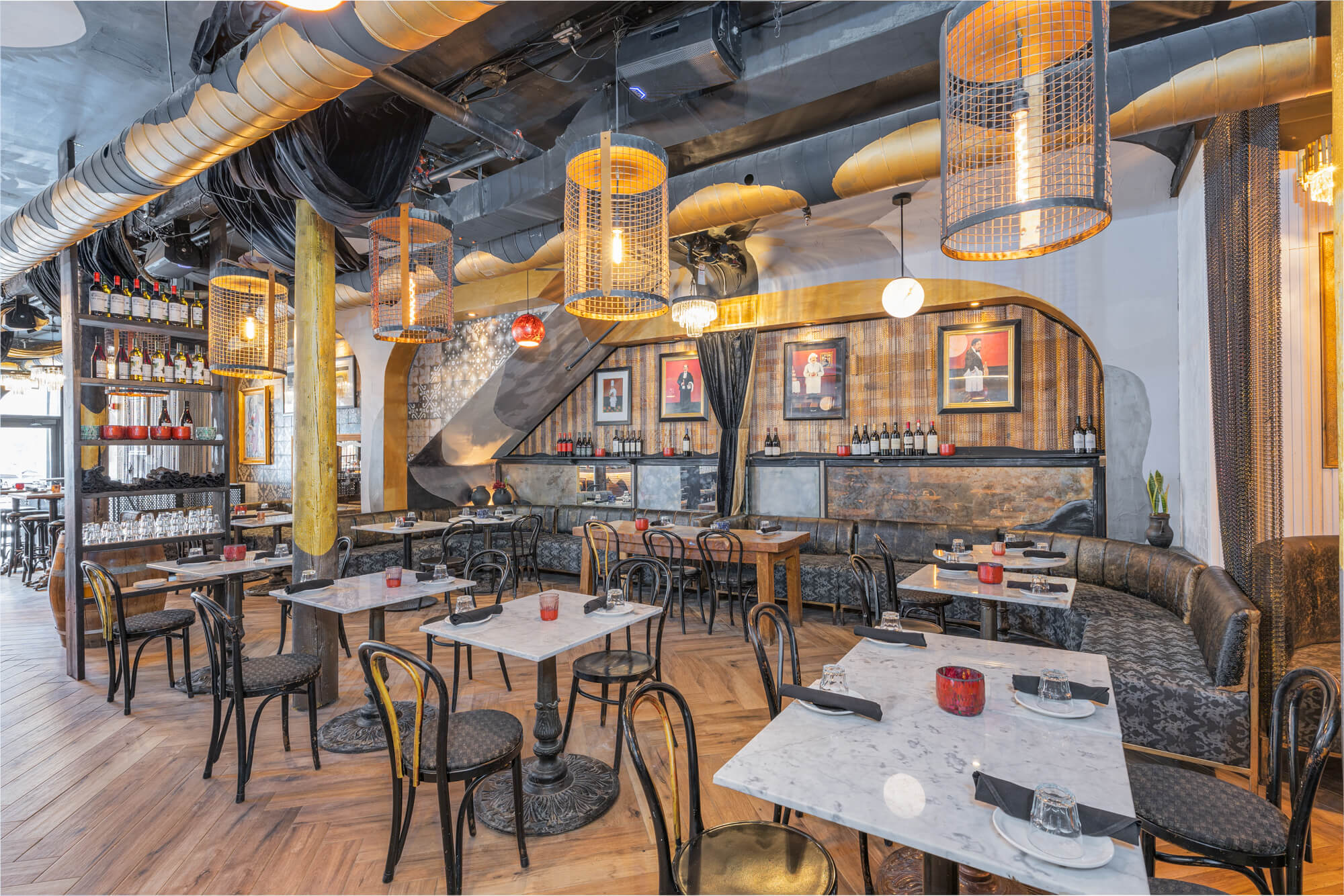 Restaurant photography in Toronto showing dining room interior with marble tables, chairs and hospitality atmosphere